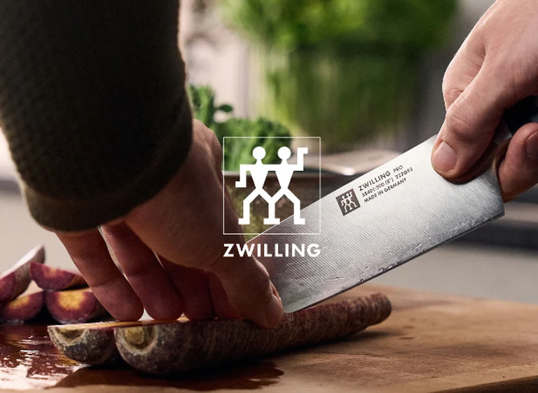 ZWILLING knives preparing ingredients in a kitchen
